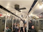 Interior of the Arnine Car with people in awe